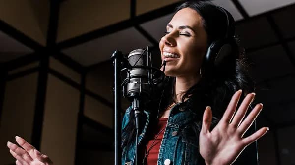 Girl Singing in a Studio