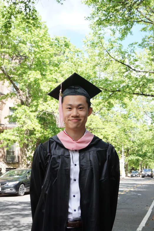 Graduation ceremony photo of Thomas 