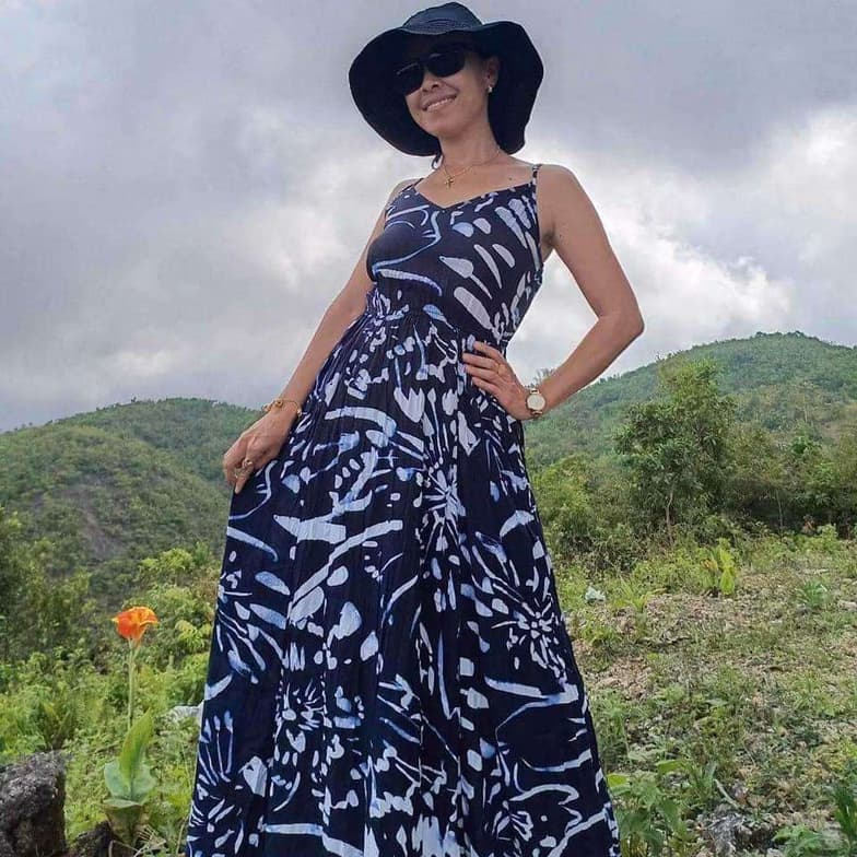 Travel snapshot of Maria Lourdes during a trip 