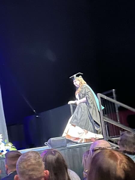 Graduation ceremony photo of Mia  