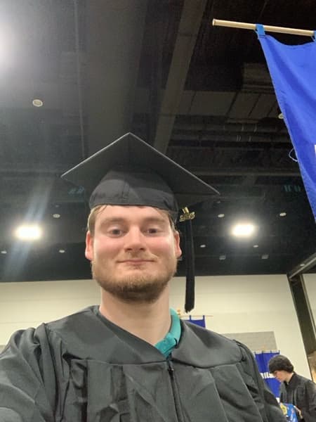 Graduation ceremony photo of Justin 