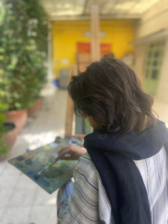 Ghazalenjoying a hobby outside teaching 