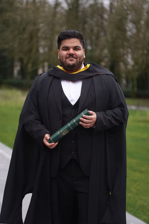 Graduation ceremony photo of Mohammed  