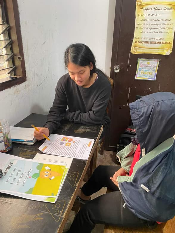 Olive Joy conducting a lesson 