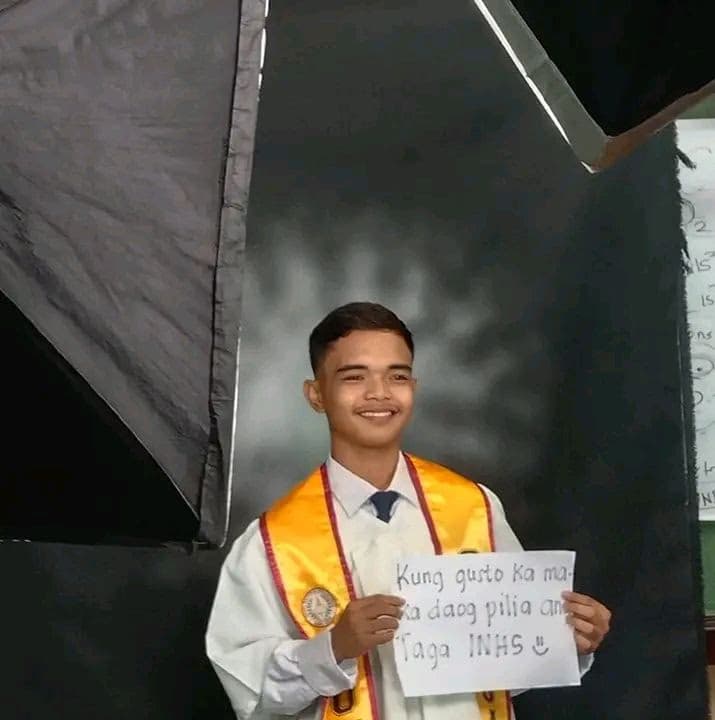 Graduation ceremony photo of Reymar Janvince  