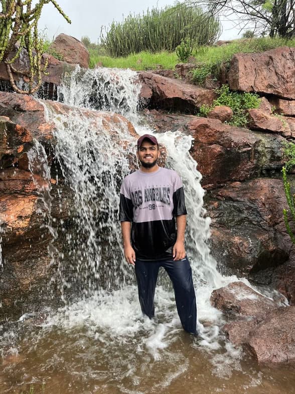 Tushar enjoying a hobby outside teaching 