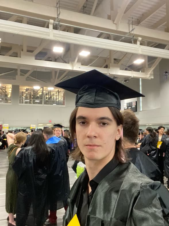 Graduation ceremony photo of Ruslan 