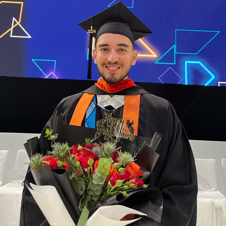 Graduation ceremony photo of Mohamad 