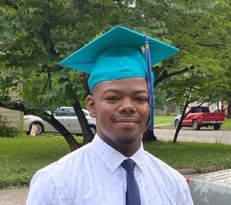 Graduation ceremony photo of Isaac  