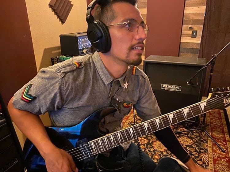 Armando enjoying a hobby outside teaching 