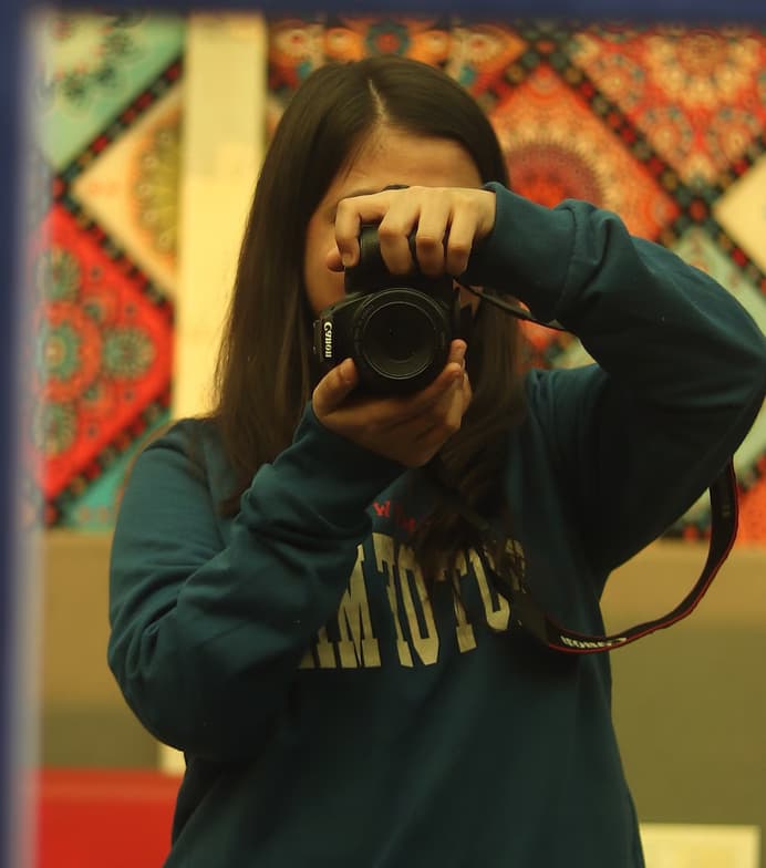 Kavita enjoying a hobby outside teaching 
