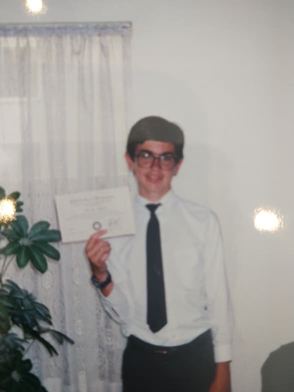 Graduation ceremony photo of Eric