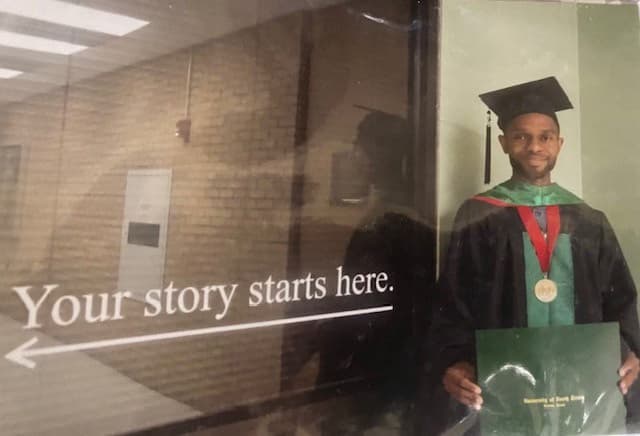 Graduation ceremony photo of Ulrich Vianney