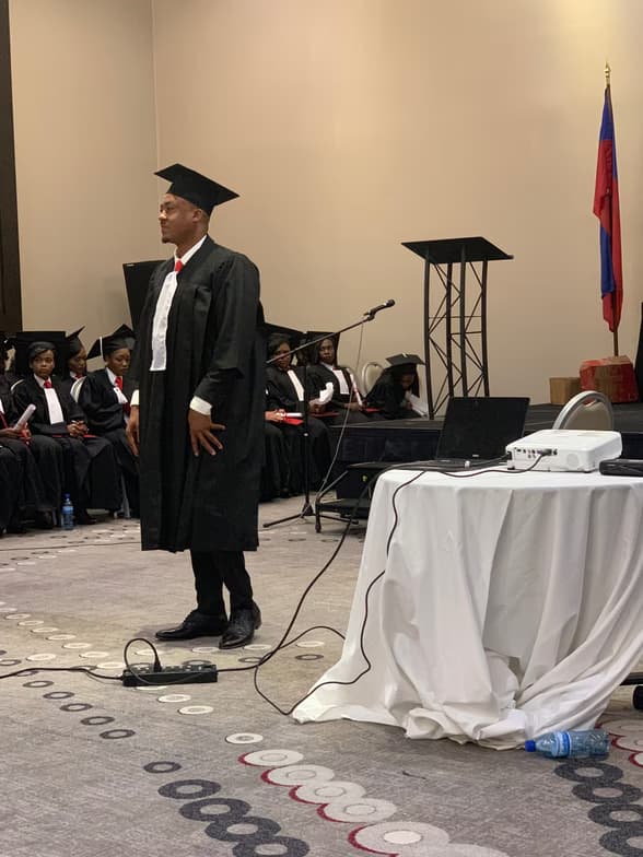 Graduation ceremony photo of Romuald  