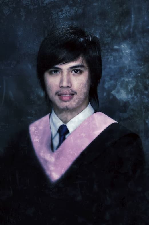 Graduation ceremony photo of Adric 