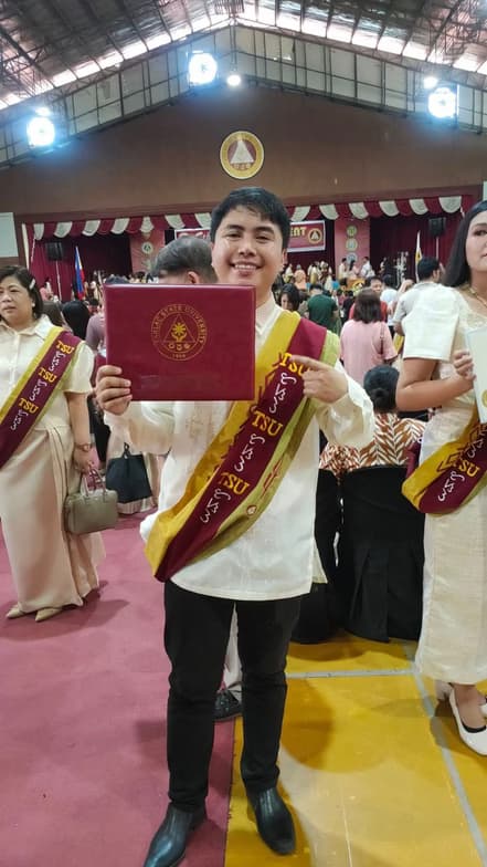 Graduation ceremony photo of Jeffrey