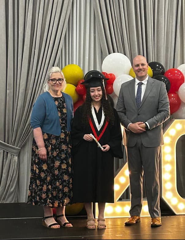 Graduation ceremony photo of Marvelle 