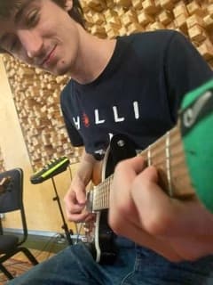 Alexenjoying a hobby outside teaching 