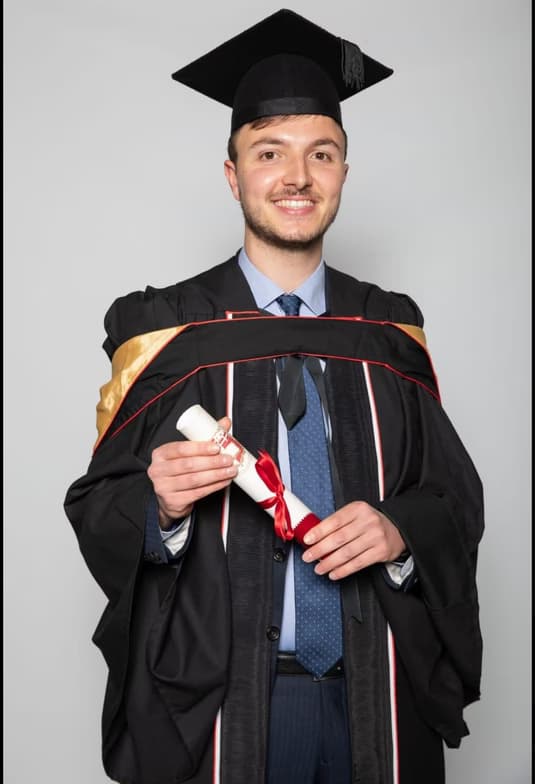 Graduation ceremony photo of Matthew 