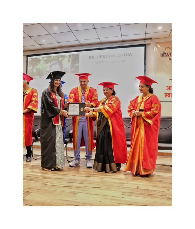 Graduation ceremony photo of Dr. Preeyal  