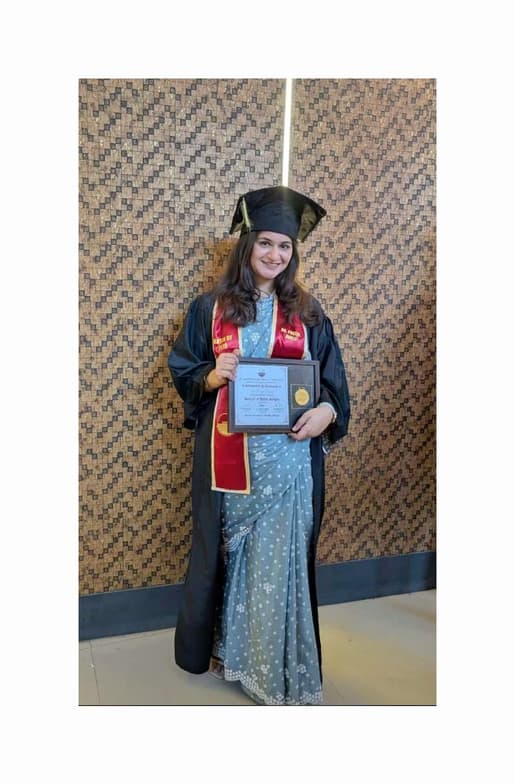 Graduation ceremony photo of Dr. Preeyal  