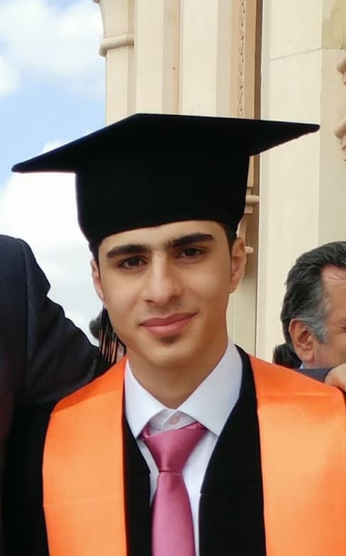 Graduation ceremony photo of Fares