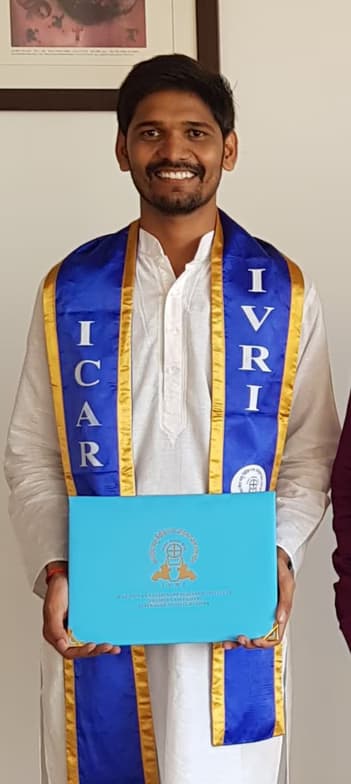 Graduation ceremony photo of Dr. Adarsh 