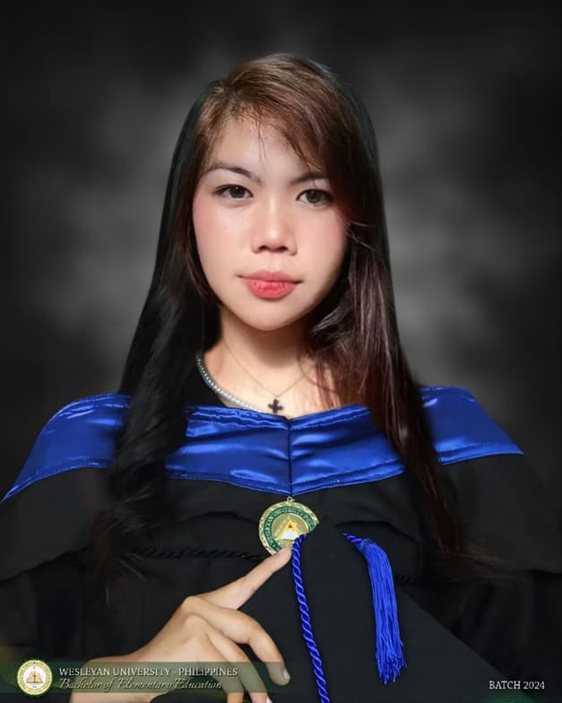 Graduation ceremony photo of Andrea 