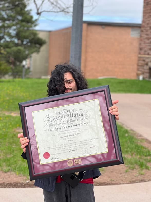 Graduation ceremony photo of Muhammad Tayyab