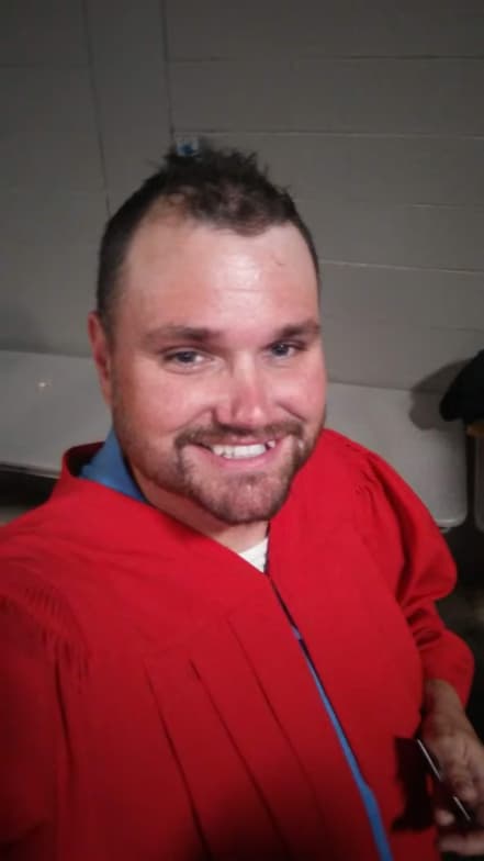 Graduation ceremony photo of Wes 