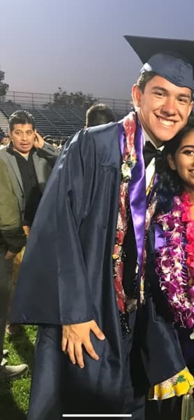 Graduation ceremony photo of Joseph  