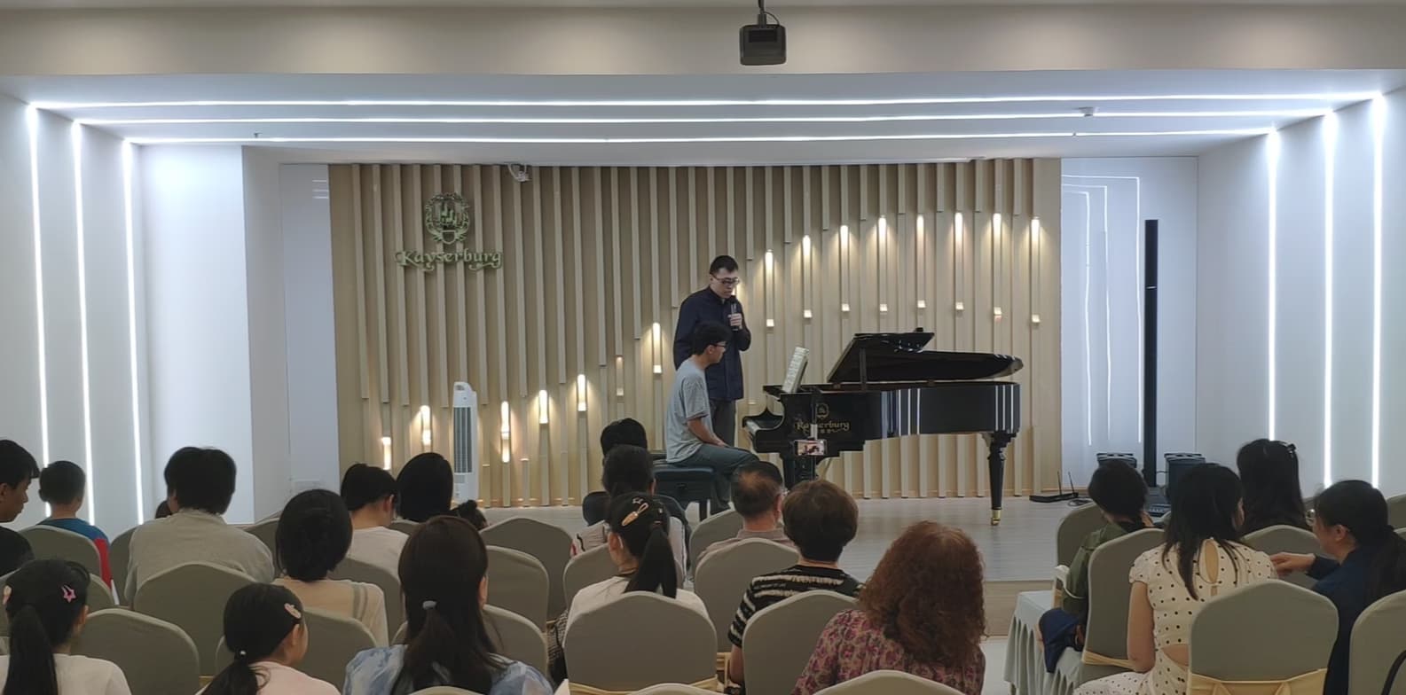 Hao conducting a lesson 