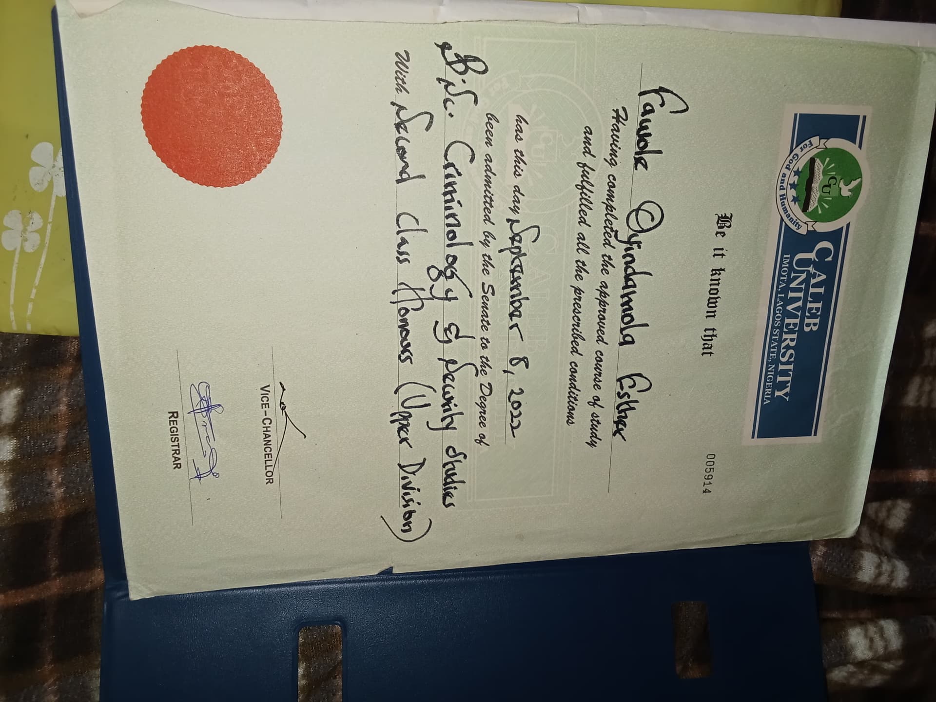 Esther graduated from Caleb University