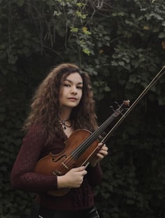 Profile photo of Gloria , undefined tutor at Wiingy