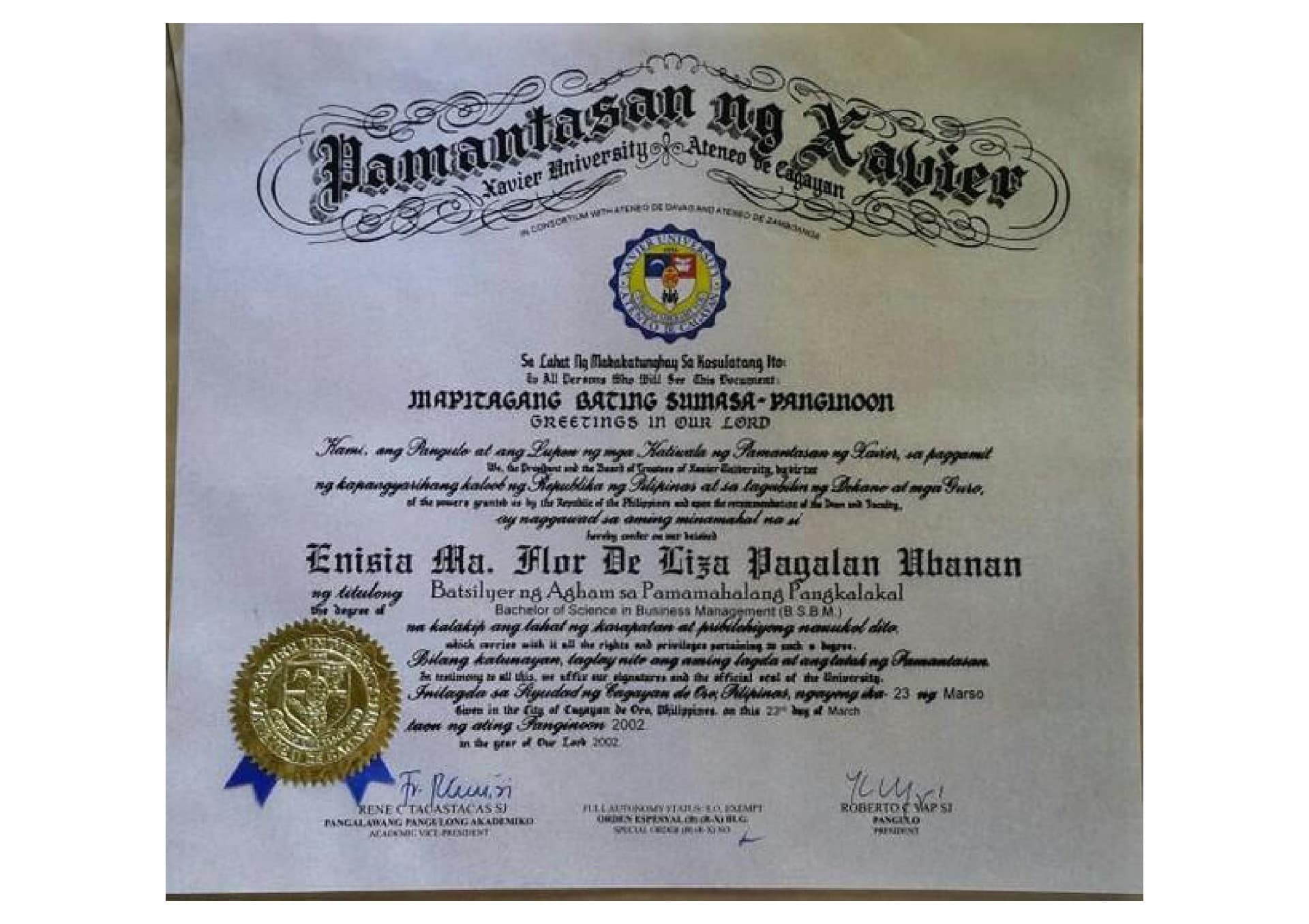 Enisia Ma. Flor de Liza graduated from Xavier University Ateneo de Cagayan