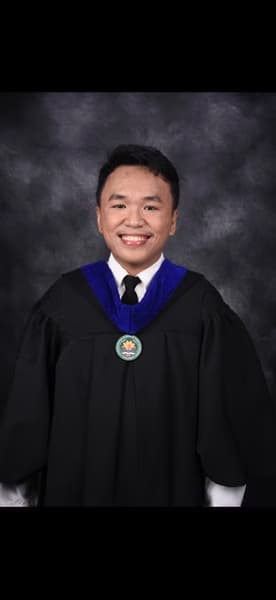 Graduation ceremony photo of Rizaldy Jose