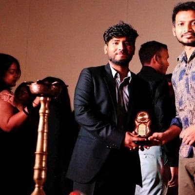 Graduation ceremony photo of Abdul