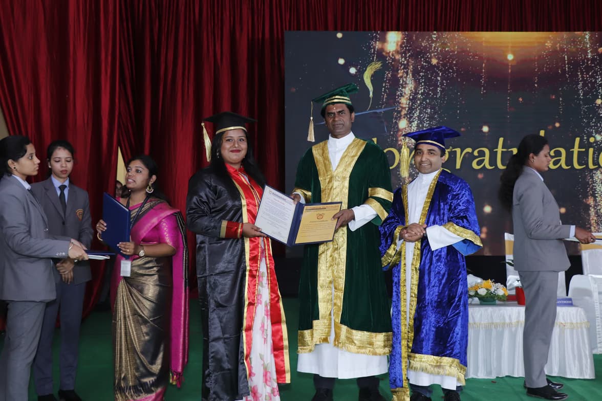 Graduation ceremony photo of Shalat Mary