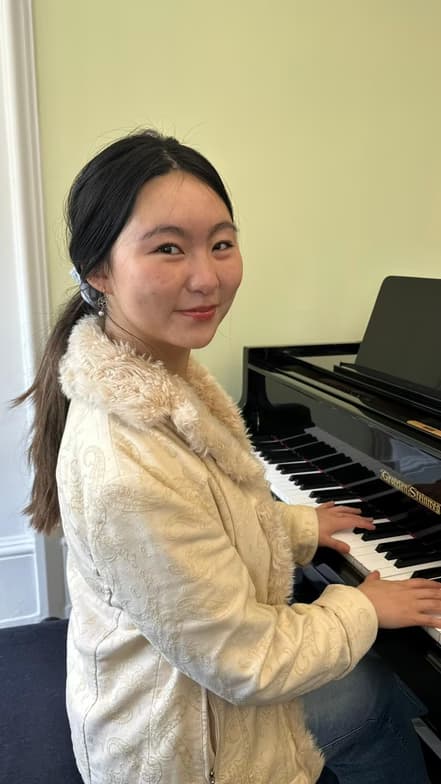 Profile photo of Muping, Music tutor at Wiingy