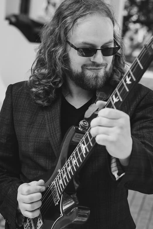 Profile photo of Ken, Guitar tutor at Wiingy