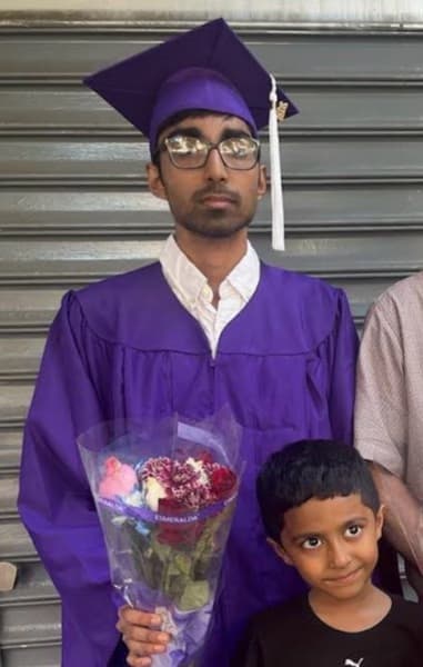 Graduation ceremony photo of Amir