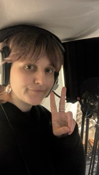 Naoise enjoying a hobby outside teaching