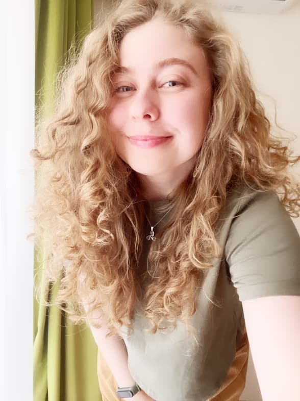 Profile photo of Dina, English tutor at Wiingy