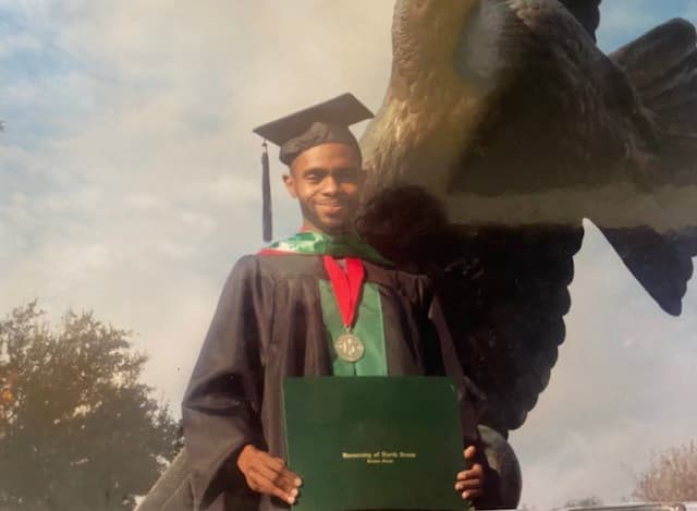 Graduation ceremony photo of Ulrich Vianney