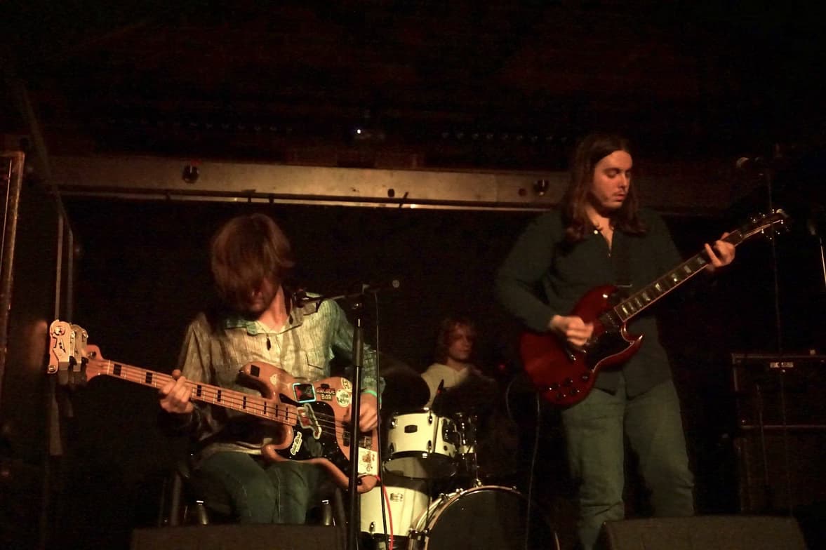 Christopher enjoying a hobby outside teaching