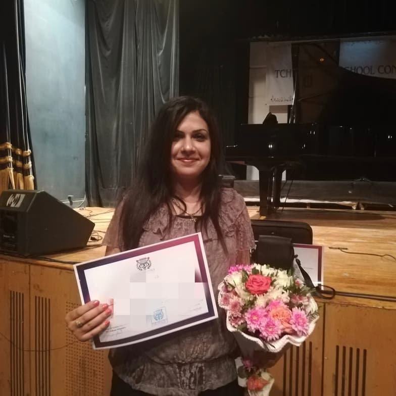 Graduation ceremony photo of Mariam