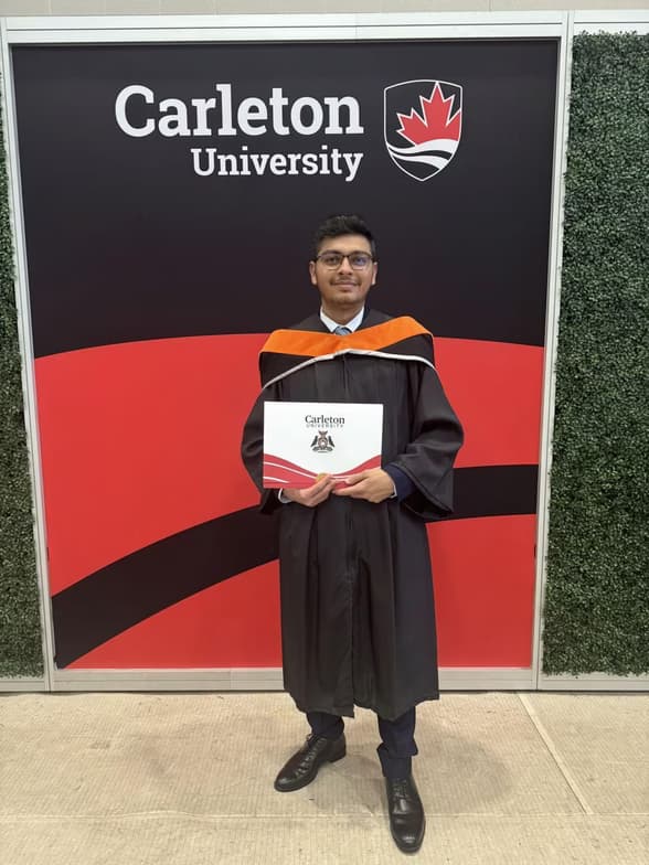 Graduation ceremony photo of Dev