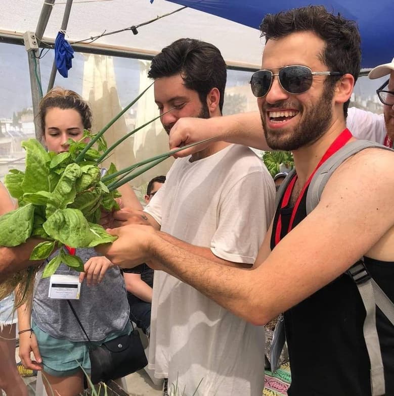 Yehuda enjoying a hobby outside teaching