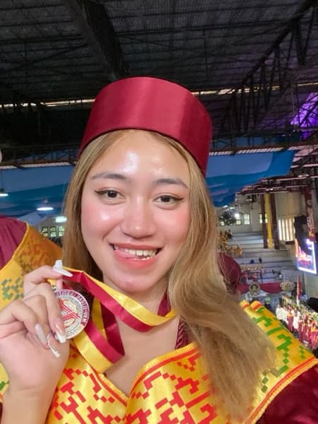 Graduation ceremony photo of Michelle Mae