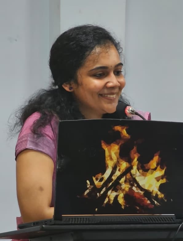 Dr. Theertha conducting a lesson